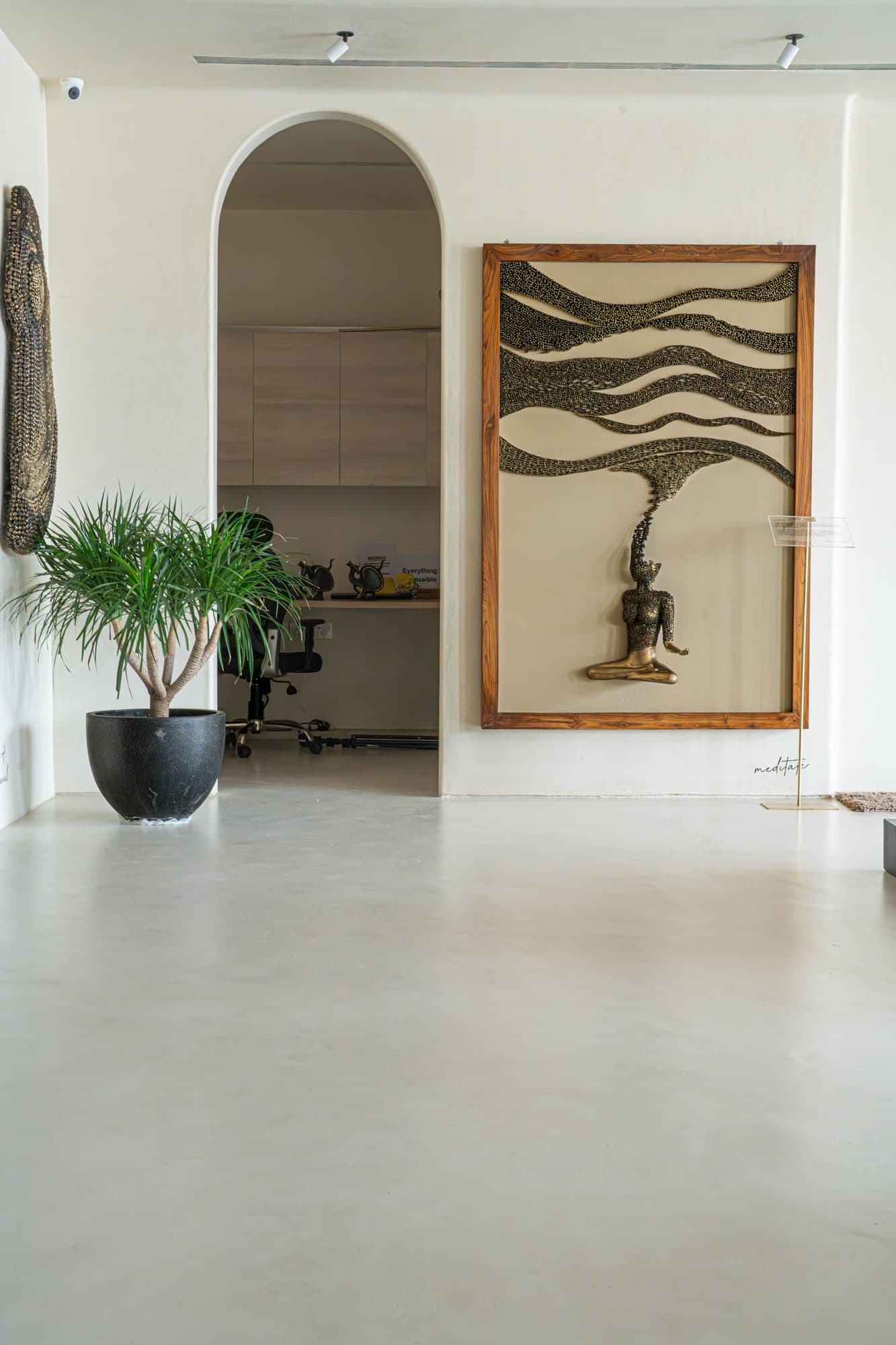 Carrara walls and ceiling above a seamless Cemento floor at Takshini, New Delhi